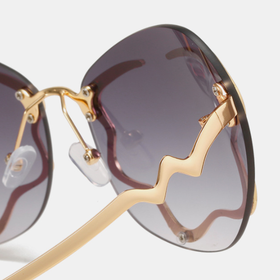 Womens Gold Design Frameless Sunglasses - Uniqua Treasures